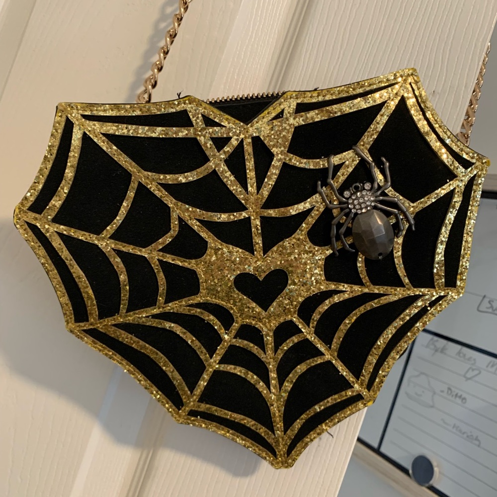 Betsey Johnson spider web purse.